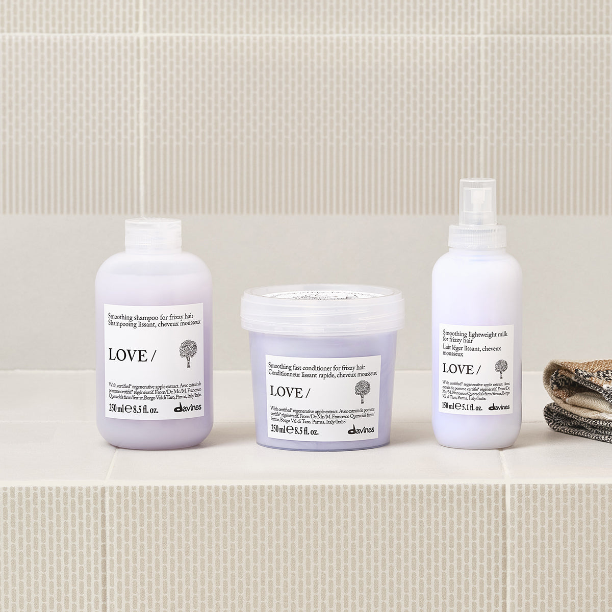 
Davines France LOVE SMOOTHING Conditioner - Après-shampoing lissant à action rapide, il discipline instantanément les cheveux indisciplinés pour une douceur incomparable