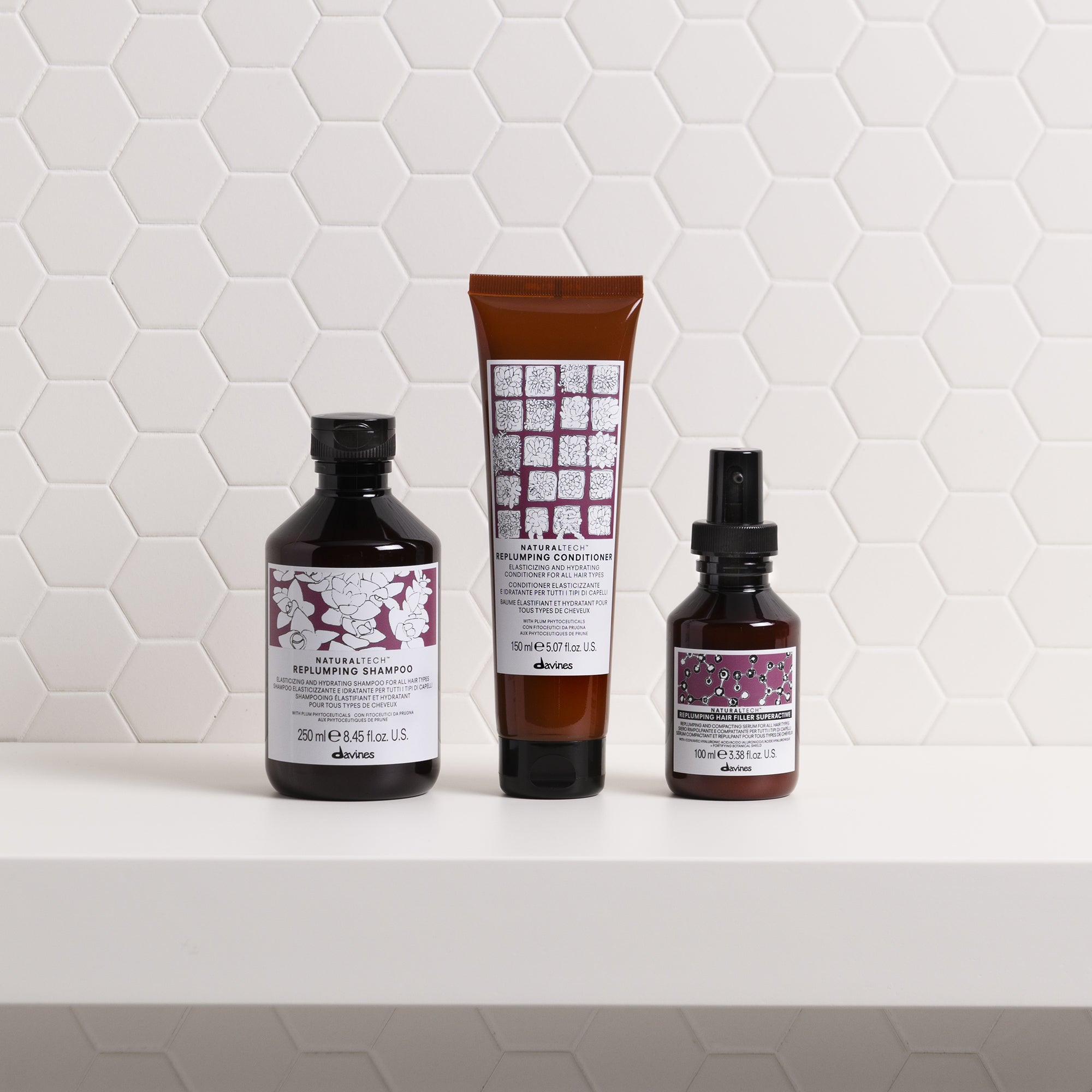 
Davines France REPLUMPING Shampoo - Shampoing repulpant et reconstituant qui hydrate et apporte du volume à tout type de cheveux